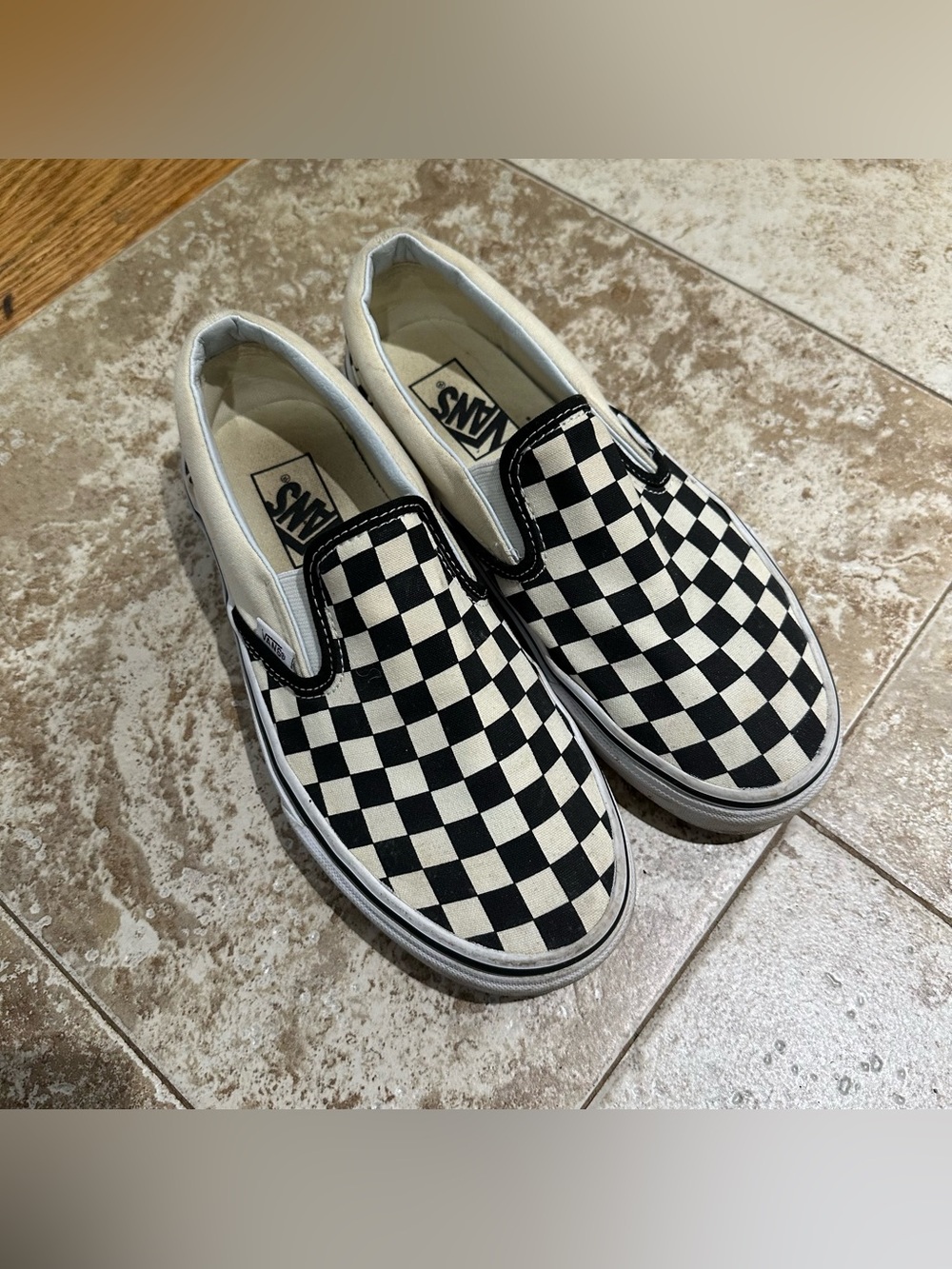 Vans Black & White Checkerboard Slip-On Sneakers